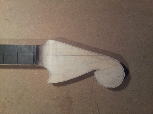 Rough cut headstock ready for profiling and sanding.